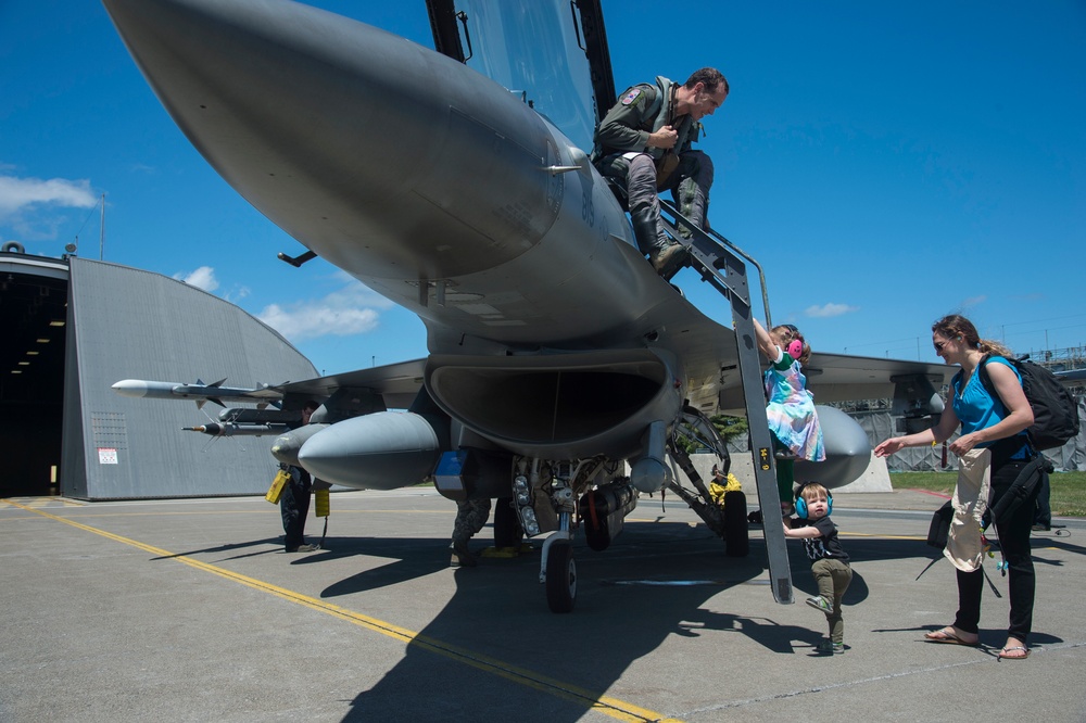 Families meet pilots on the runway