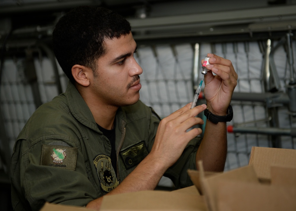 Sailor Fills Syringe