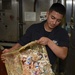 Sailor Works In Nimitz Trash Room