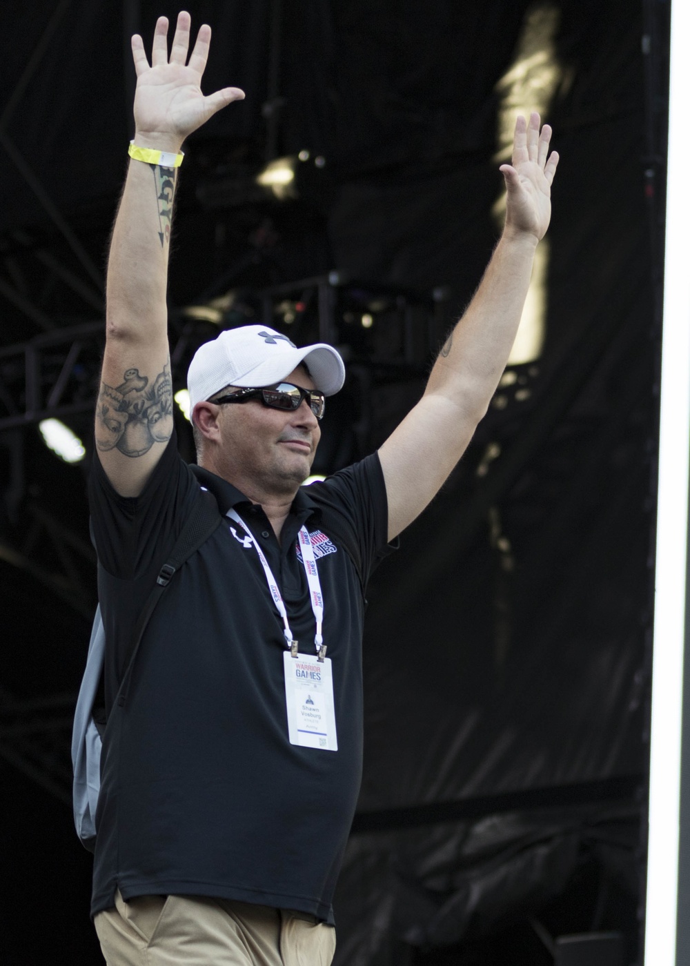 Master Sgt. Shawn Vosburg waves to the crowd
