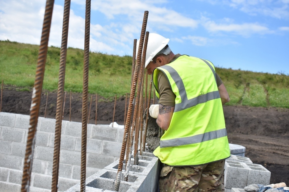 U.K. Royal Monmouthshire Royal Engineers enhance training area at the JNTC