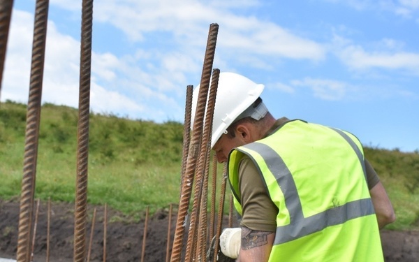 U.K. Royal Monmouthshire Royal Engineers enhance training area at the JNTC