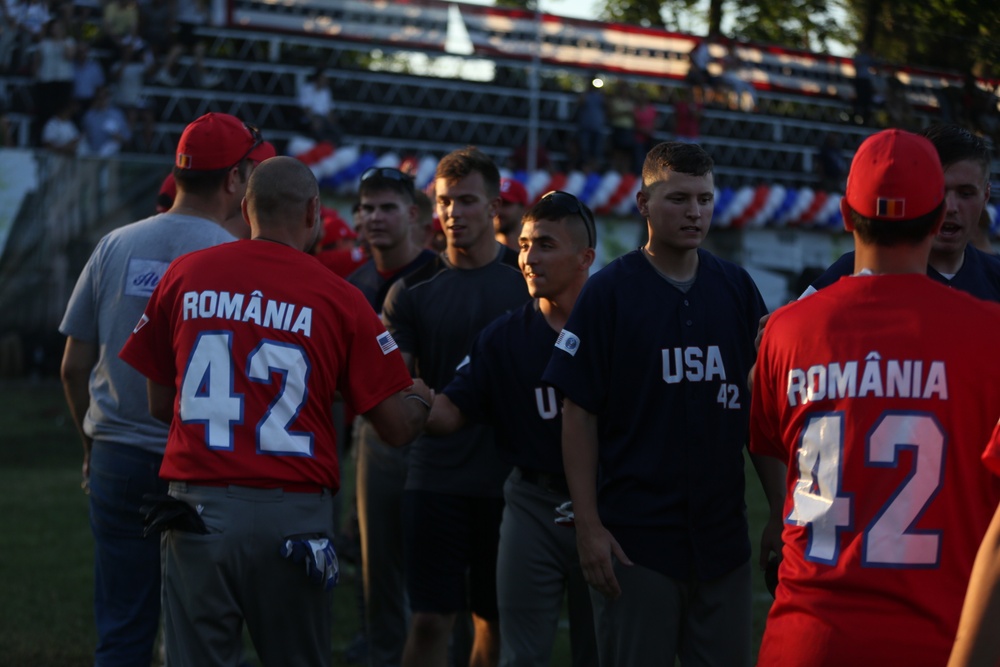 Play Ball: U.S. and Romanian teams play a friendly game