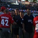 Play Ball: U.S. and Romanian teams play a friendly game