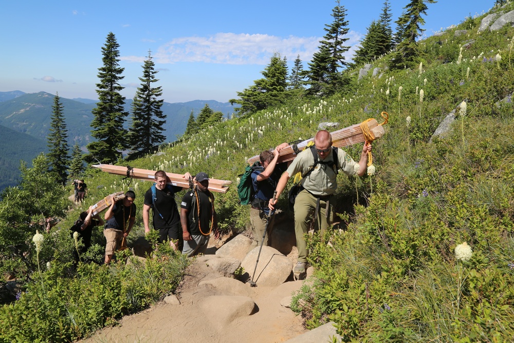 1st Special Forces Group (Airborne) Soldiers Carry the Load for the Forest Service