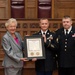 Governor Kay Ivey presents major awards to two Alabama National Guard Soldiers