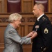 Governor Kay Ivey presents major awards to two Alabama National Guard Soldiers