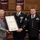 Governor Kay Ivey presents major awards to two Alabama National Guard Soldiers