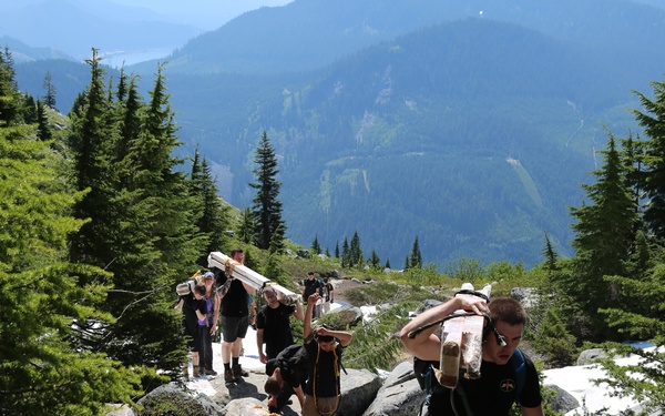1st Special Forces Group (Airborne) Soldiers Carry the Load for the Forest Service