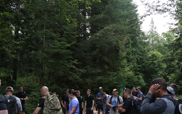 1st Special Forces Group (Airborne) Soldiers Carry the Load for the Forest Service