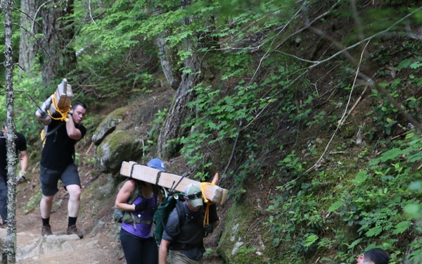 1st Special Forces Group (Airborne) Soldiers Carry the Load for the Forest Service