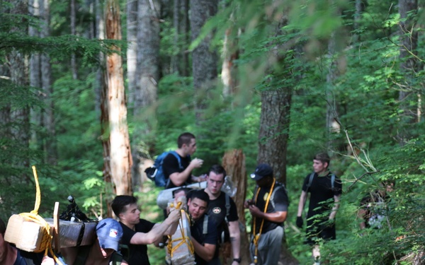 1st Special Forces Group (Airborne) Soldiers Carry the Load for the Forest Service