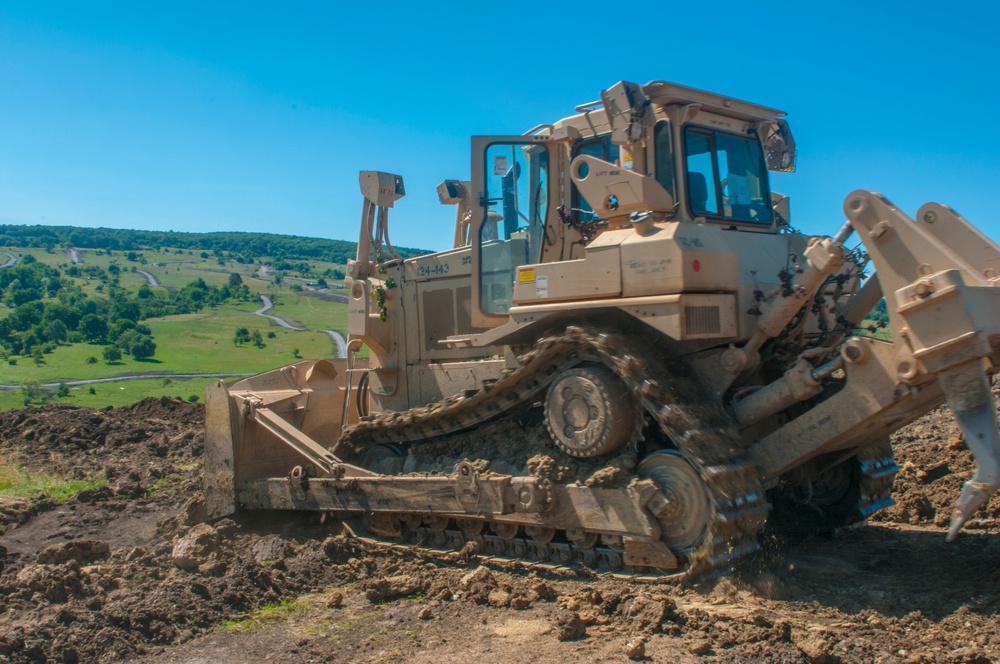 Engineer Brigade uses a D7R II Dozer to remove a dirt bank.