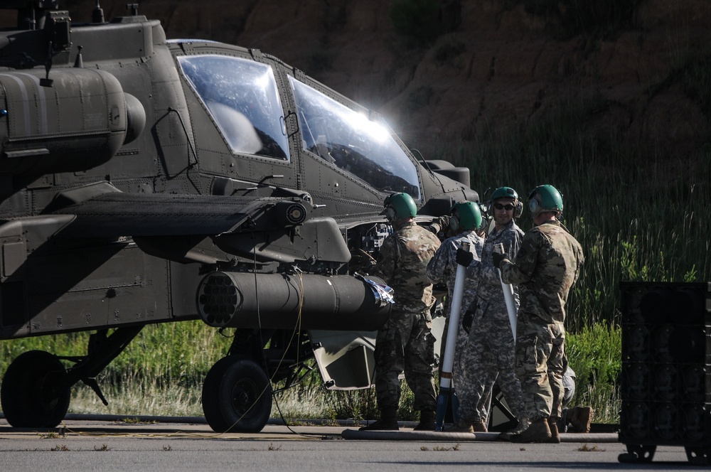 Soldiers arm aircraft during annual training