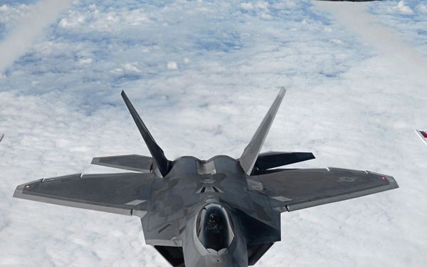 100th ARW Tankers refuel Thunderbirds, F-22s