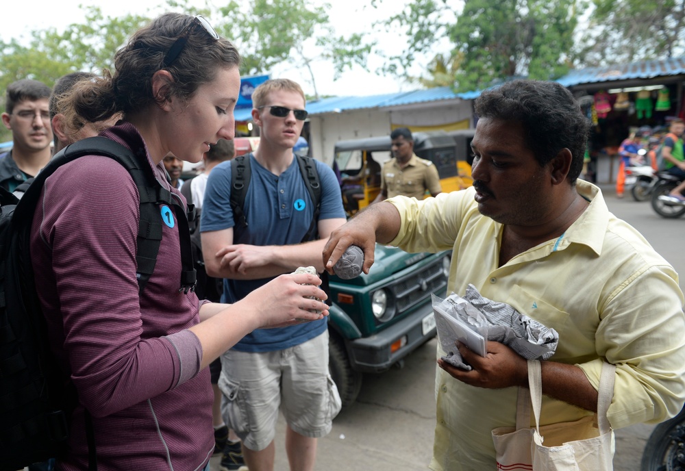 Sailor Speaks With Indian Vendor