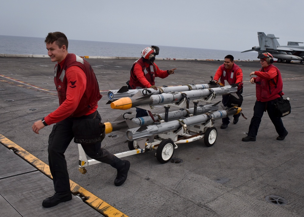 Sailors Move Missiles