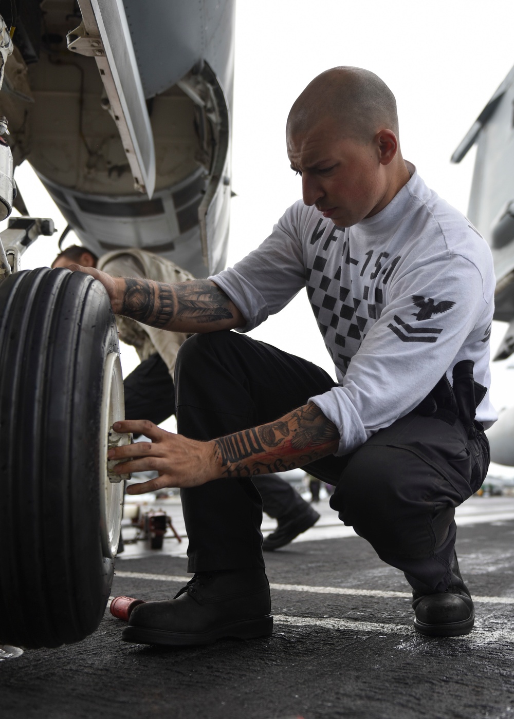 Sailor Replaces Aircraft Tires