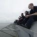 Sailors Sit On Bow