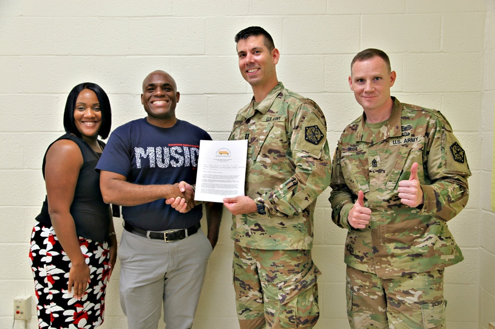 704th Military Intelligence Brigade joins Partners in Education; adopts MacArthur Middle School