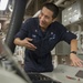 USS America Sailor conducts maintenance