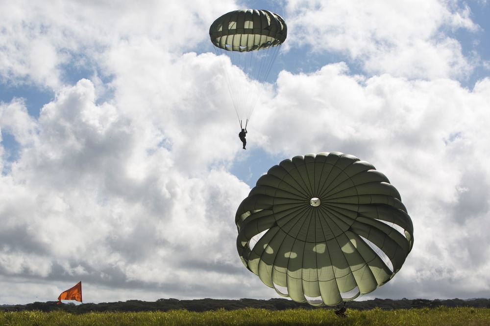 Drop feet first: Recon Marines conduct airborne jumps