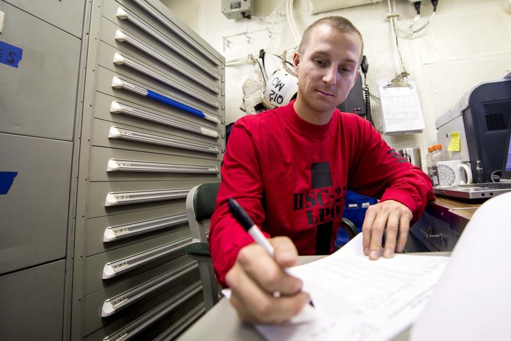 HSC-23 Sailors aboard USS America certifies aircraft for flight