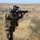 U.S. Marines and Members of the South African Maritime Reaction Squadron swap weapons during Exercise Shared Accord