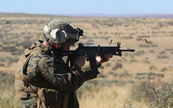 U.S. Marines and Members of the South African Maritime Reaction Squadron swap weapons during Exercise Shared Accord