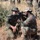 U.S. Marines and Members of the South African Maritime Reaction Squadron swap weapons during Exercise Shared Accord