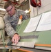 JSTARS aircraft structural maintenance specialists design innovative iPad holder for E-8C Joint STARS