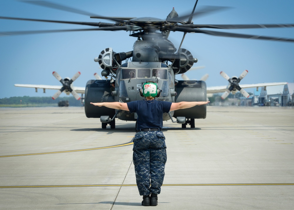 Sailor signals MH-53
