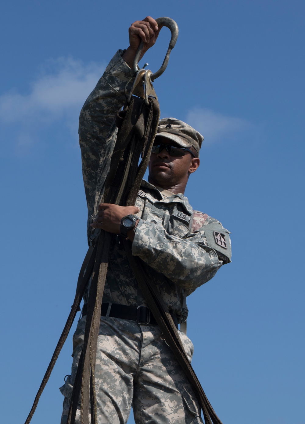 Troops sling load supplies to keep comrades in fight