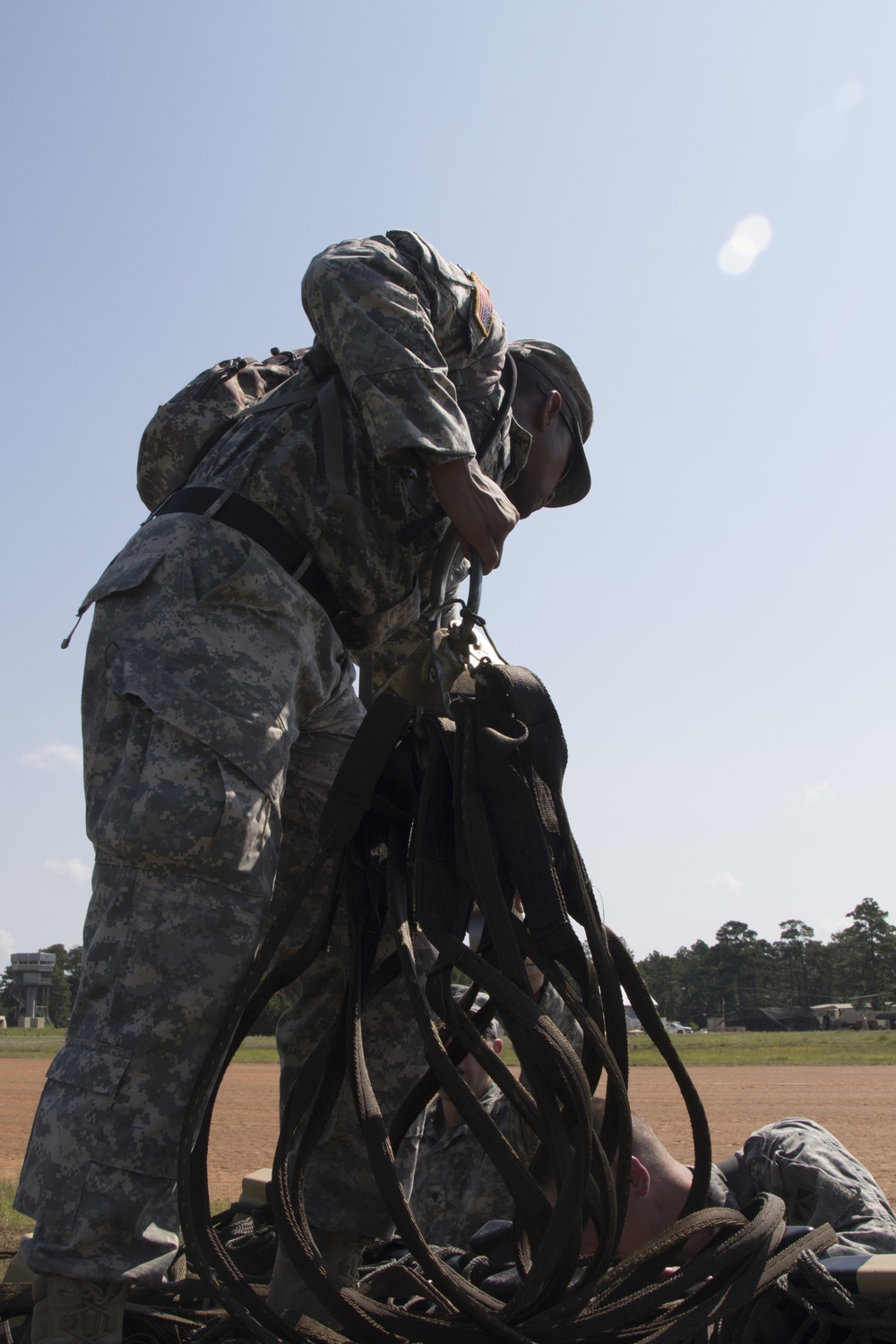Troops sling load supplies to keep comrades in fight