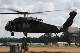 Troops sling load supplies to keep comrades in fight