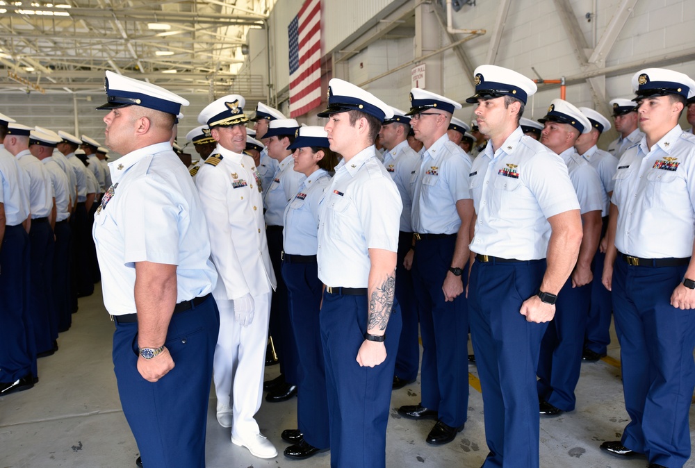 Coast Guard Captains conduct personnel inspection during Change of Command Ceremony