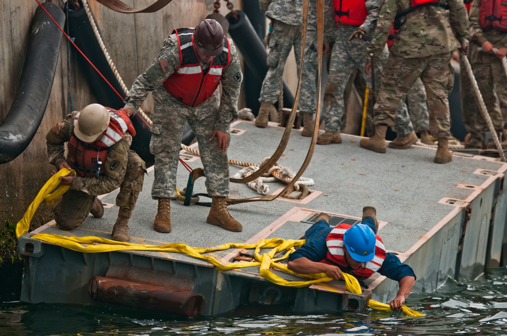 Active Army, Reserve Soldiers construct massive causeway