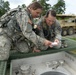 Soldiers with 138th Quartermaster bear water to keep 76th troops hydrated