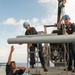 USS America Sailors move surface-to-air intercept missiles