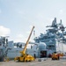 USS America Sailors move surface-to-air intercept missiles