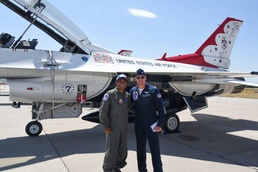 Champion bull rider Juan Alonzo takes a flight with the Thunderbirds