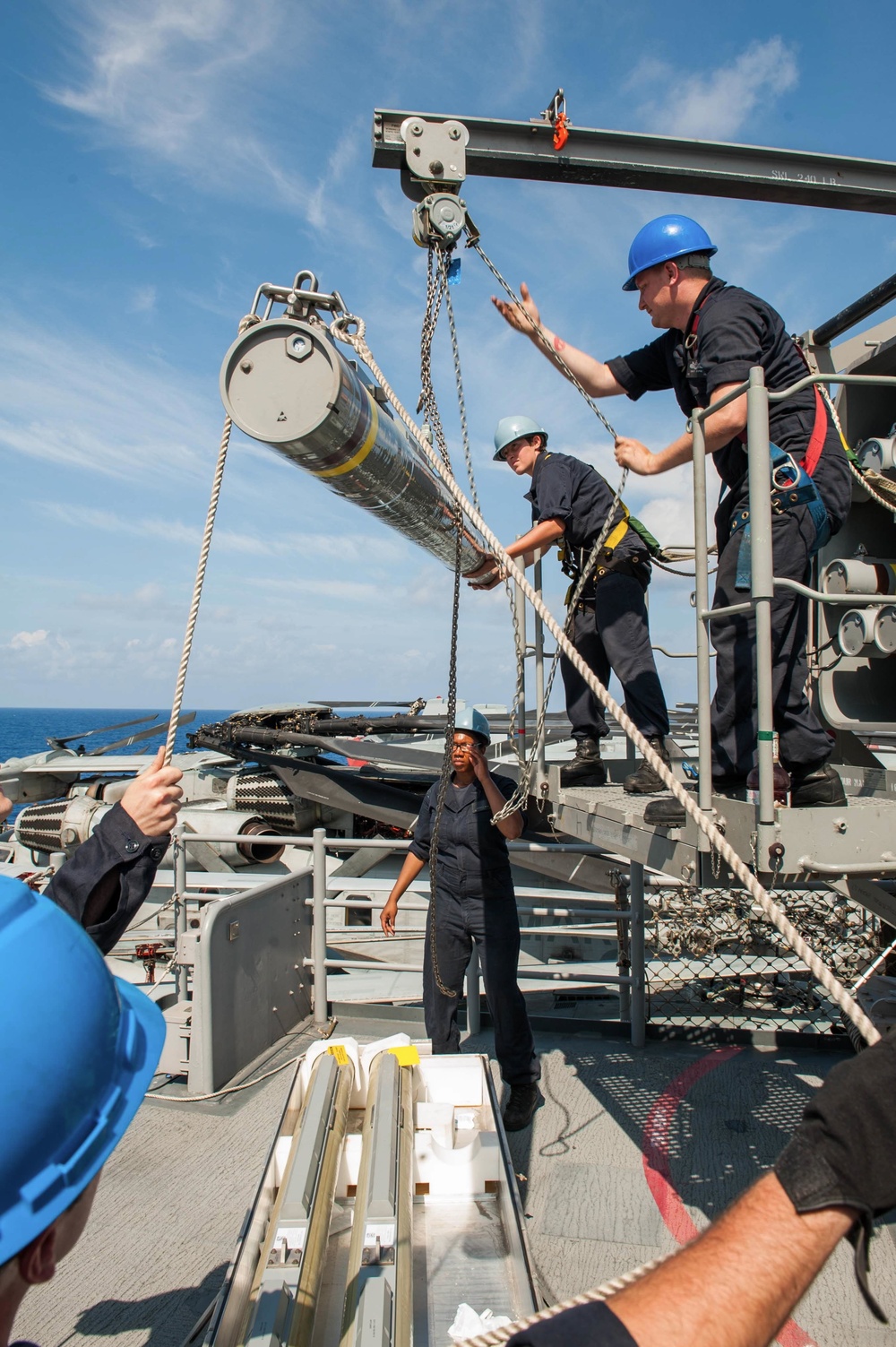 USS America Sailors move surface-to-air intercept missiles