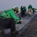 Sailors Work On Catapults