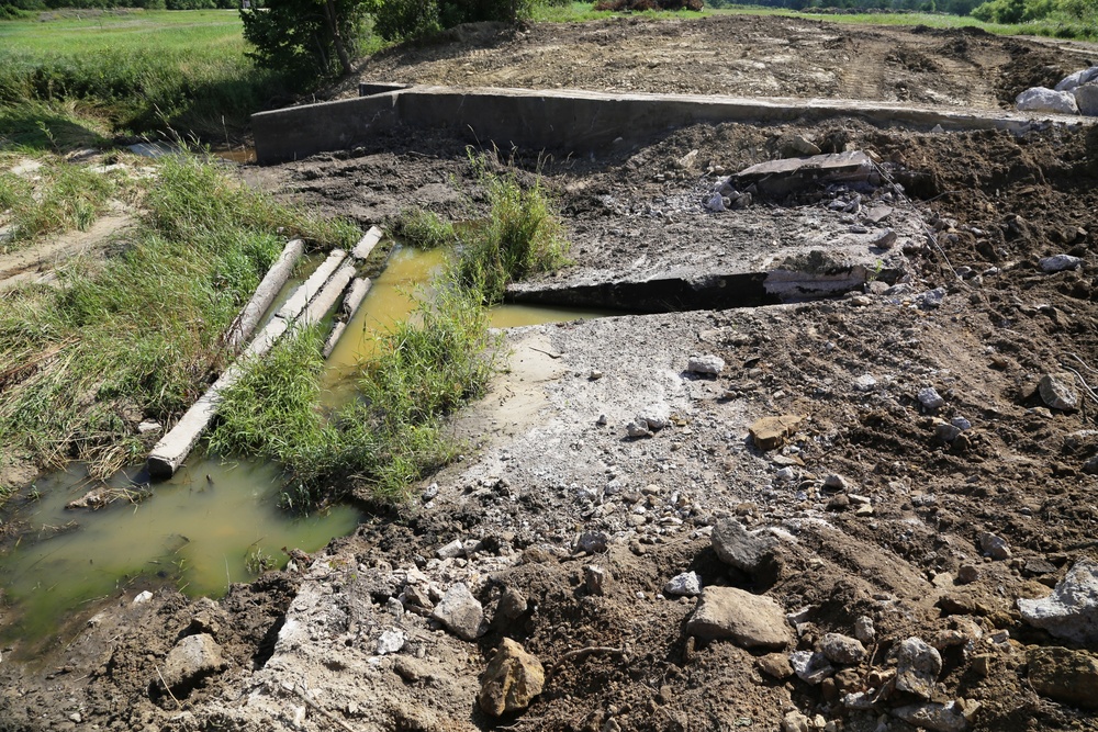 Work to remove West Silver Wetland Dam to improve stream habitat at Fort McCoy