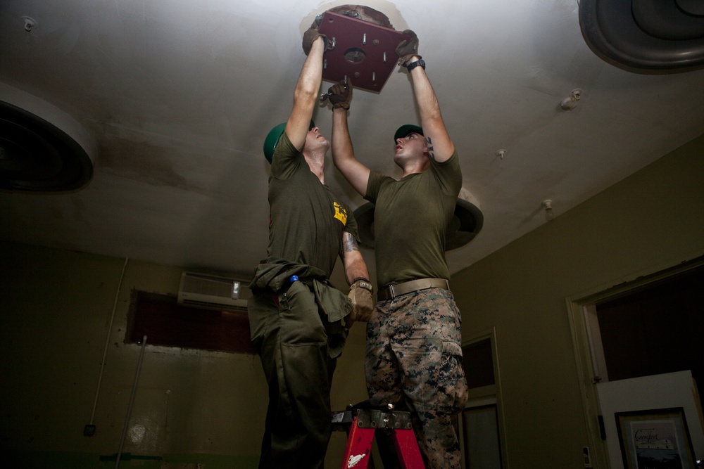 Marines with the SPMAGTF-SC renovate Price Barracks hospital