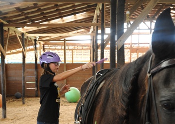 RIDES supports military families through therapeutic horse riding