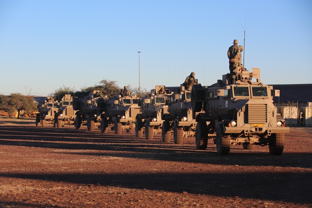 U.S. Marines and members of South African Maritime Reaction Squadron head into the bush during Exercise Shared Accord