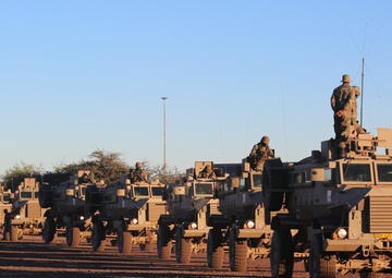 U.S. Marines and members of South African Maritime Reaction Squadron head into the bush during Exercise Shared Accord