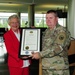 Alabama Gov. Kay Ivey presents Maj. Gen. Perry G. Smith a commendation award during a change of command ceremony at Alabama National Guard Joint Force Headquarters, Montgomery, Alabama, July 28, 2017.