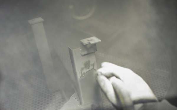 Sandblasting MAAS components.